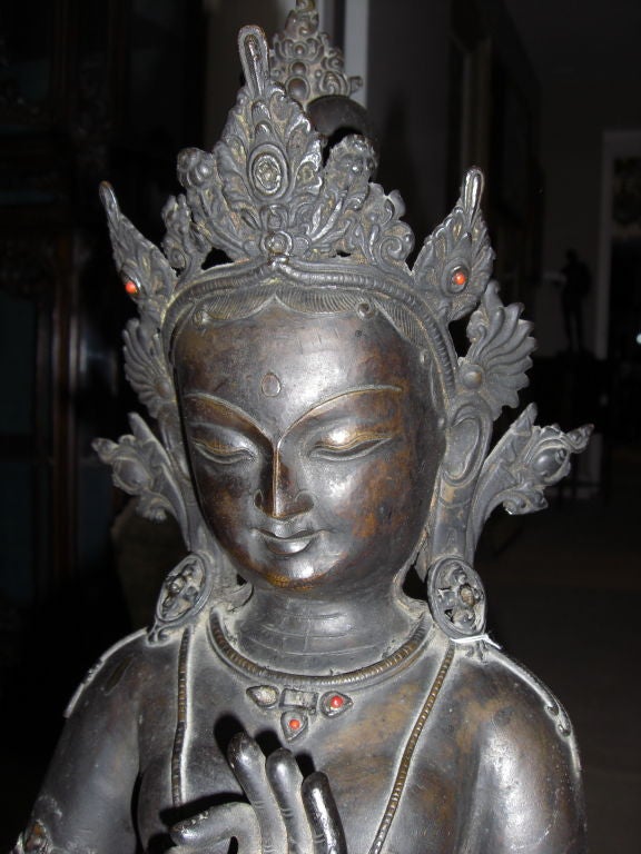 A 19th century (and possibly earlier) Indian bronze statue of a Hindu Goddess , Tara. Nice cast but two old repairs (one at the waist and one at the right arm). Originally meant to stand in a niche.