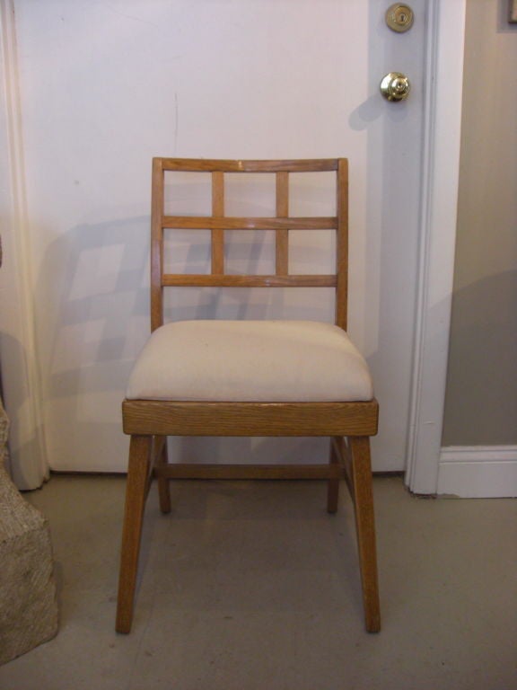 A quality set of 4 limed oak side chairs with a newly restored finish, newly re-upholstered seats (muslin). These chairs have a nice form and are very sturdy.