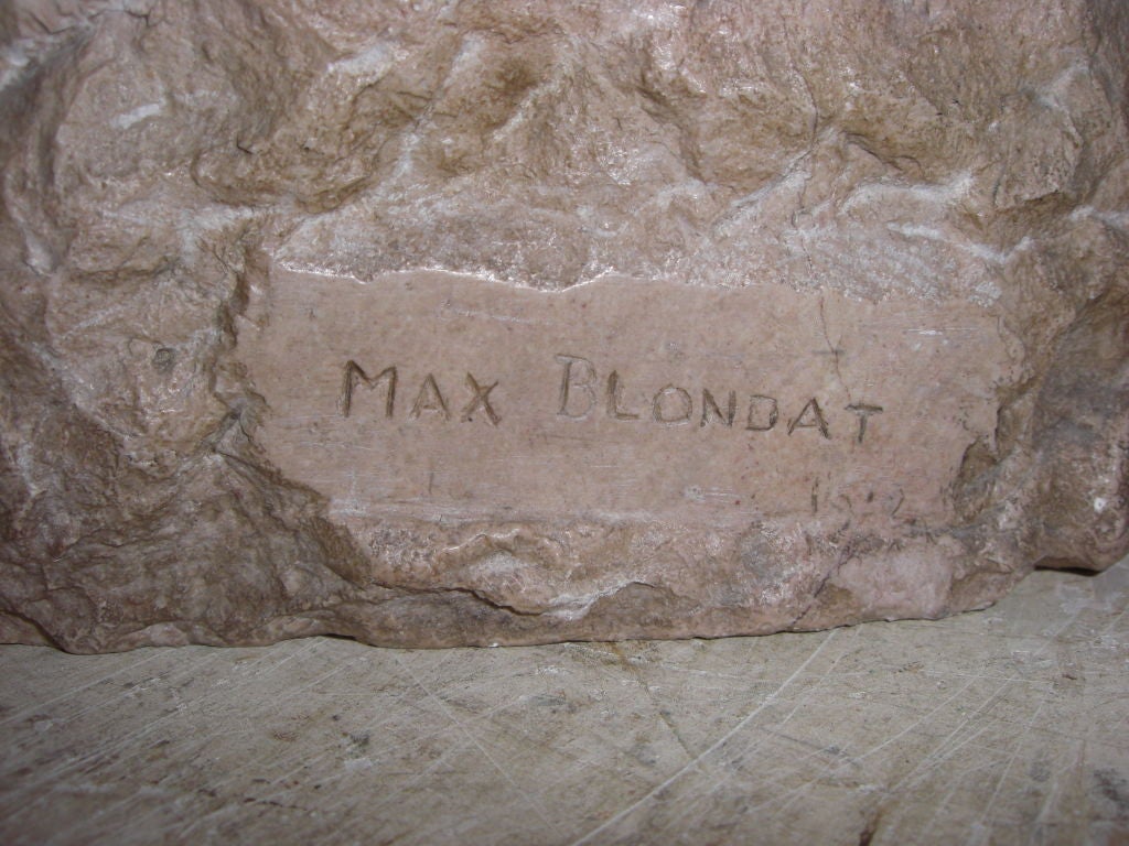 carved stone bust of a young boy signed Max blondat 2