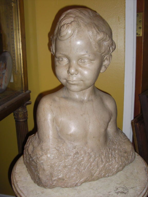 A charming carved stone bust of a little boy by well listed french sculptor Max Blondat dated 1922. Beautifully executed with a very 