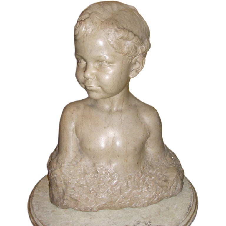 carved stone bust of a young boy signed Max blondat