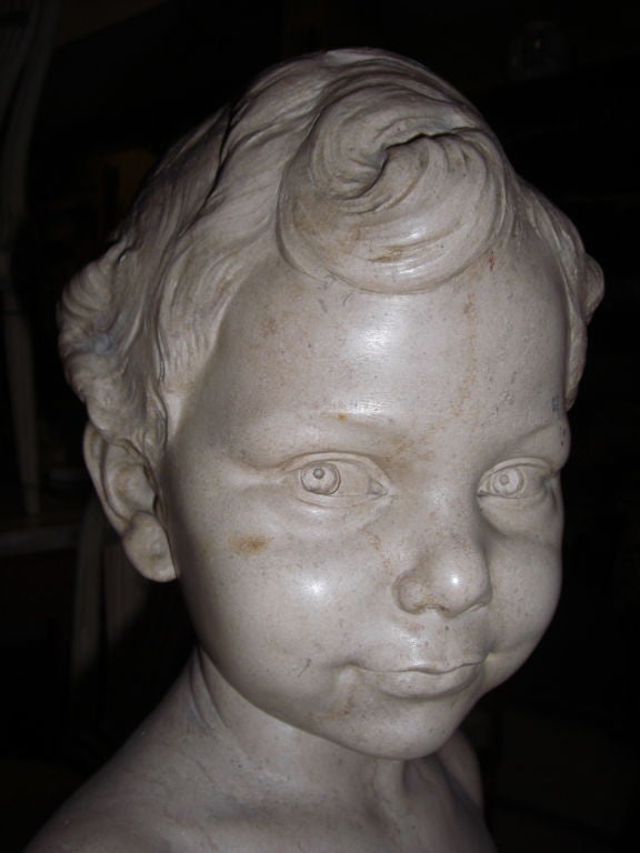 French carved stone bust of a young boy signed Max blondat