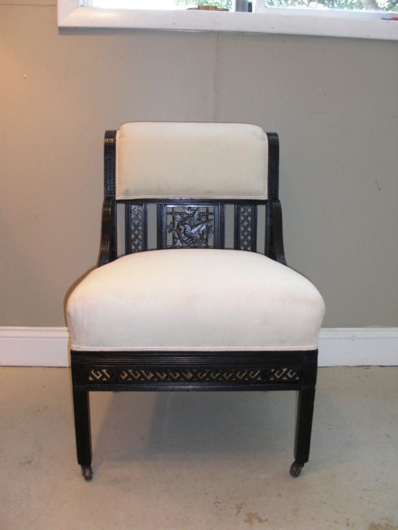 A nice pair of ebonized aesthetic movement chairs with  