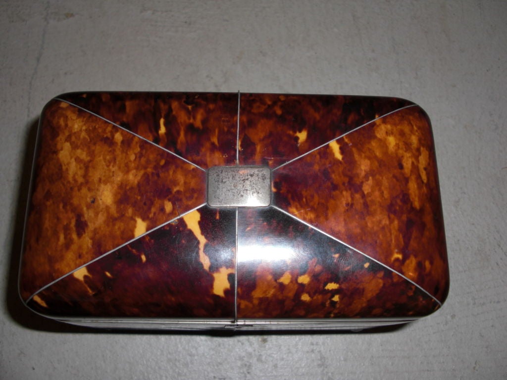 English regency tortoise shell ivory and silver tea caddy