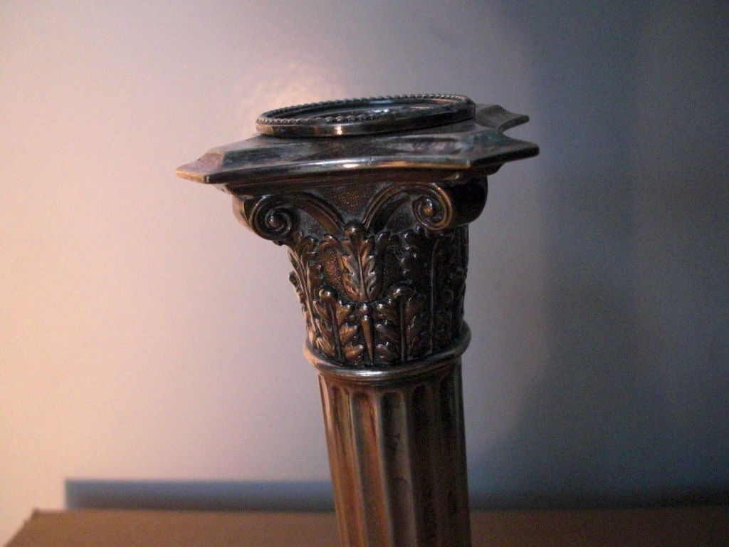 20th Century set of four Tiffany silverplate columnar candlesticks