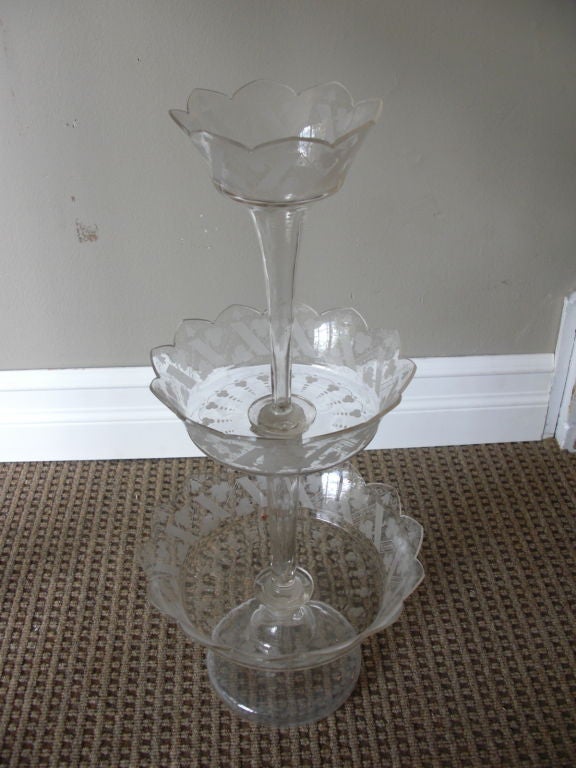 A very delicate 3-tier wheel engraved glass epergne. It is probably English circa 1850/1860.