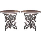 Pair of cast iron marble top tables