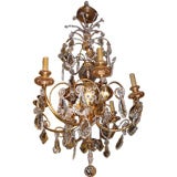 1940
s French gilt bronze and crystal chandelier 1940
s French gilt bronze and crystal chandelier
