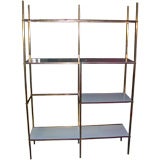 Bronzed frame and milk glass etagere by Harvey Probber
