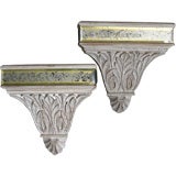 Pair of 1940
s wall planters with reverse painted glass frieze