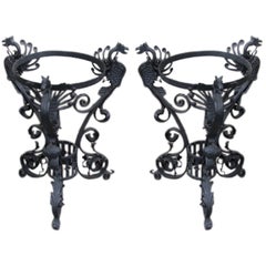 Pair of outstanding wrought iron urn stands circa 1900