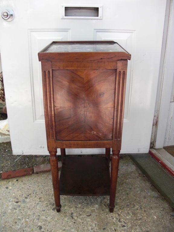 A provincial Louis XVI marble top 2-tier stand