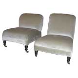 A "near pair "of Napoleon III slipper chairs
