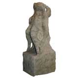 Antique carved stone gargoyle downspout