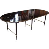 Oval dining table by Paul Mc Cobb