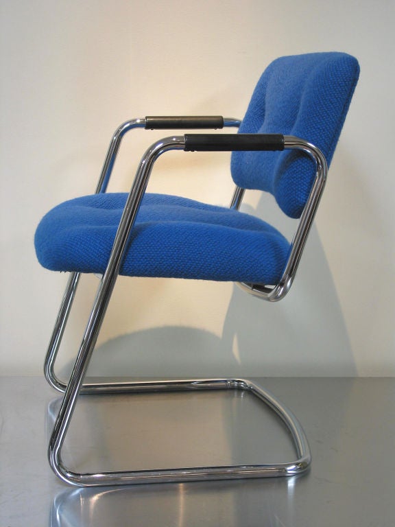 Set of four 1970's Steelcase armchairs<br />
Electric blue textile,<br />
tubular chrome frame with black arm pads.<br />
<br />
(price is for each)<br />
Only one chair left!