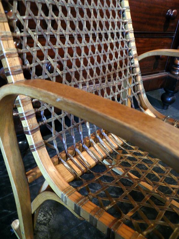 Bent Ash and Gut strung Armchair.  Wonderfully sturdy and comfortable model found around the Great Lakes regions.  The modernist bent ash frame contrasting with the translucent gut stringing.  Beautiful profile.
