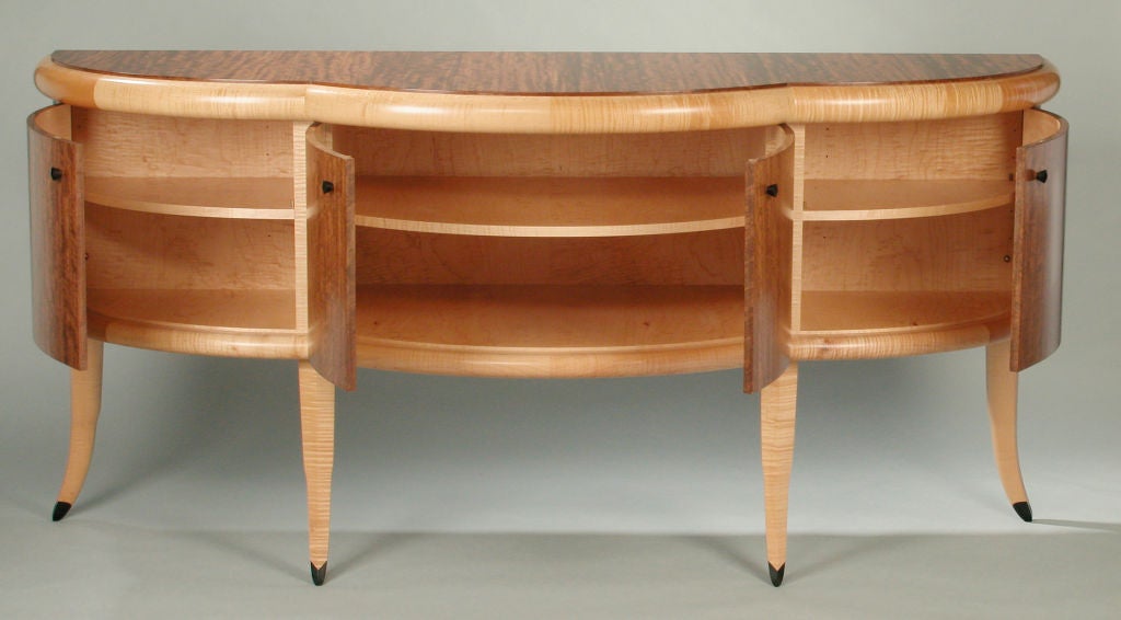 Superbly crafted and beautifully designed sideboard/buffet by the Studio Furniture master, Wendell Castle.  Matching table available.