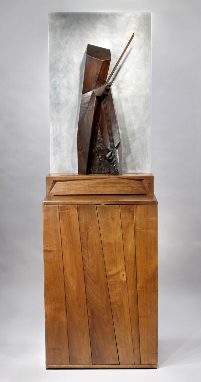 Unique and extremely important sculpture with accompanying light box and music cabinet/pedestal.  Made for Philadelphia Orchestra concertmaster and 1st violinist, Alexander Hilsberg.  Signed and dated 1931