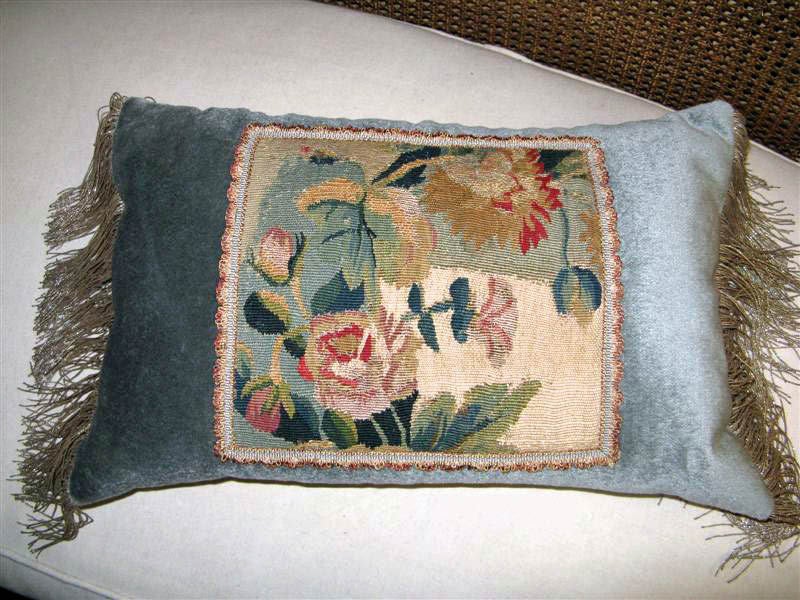 Pair of 18th C. Aubusson Fragments framed with silk mohair and antique silver metallic fringe.  These accent pillow would be perfect on a pair of armchairs or small settee.