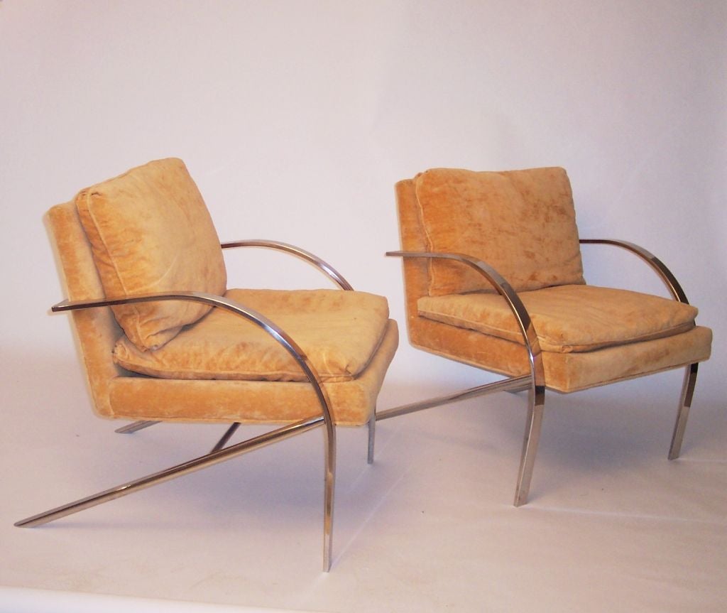 Excellent original condition chromed steel chairs. Upholstered in butterscotch velour, giving the appearance of soft chamois.