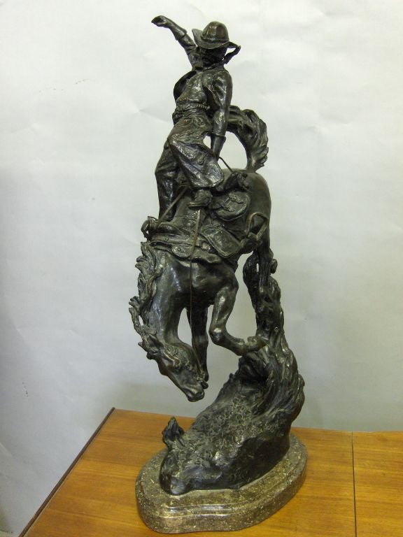 Bronze Cowboy on a Horse