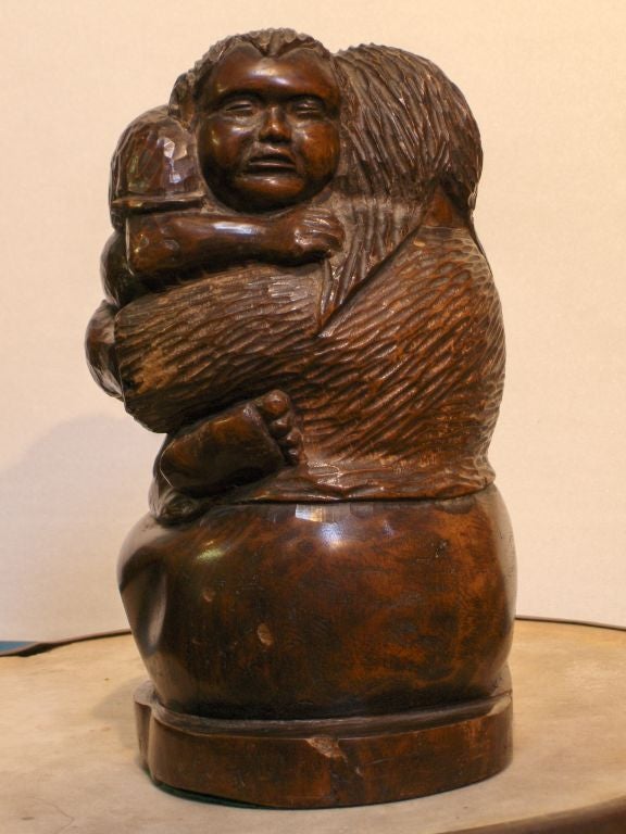 Circa 1930 this piece is done by Flores Arias who was a classically trained Mexican artist known for his carvings that illustrate the plight of Mexican peasantry. Flores Arias worked in the same company as Diego Rivera, Mardonio Magana and Roberto  