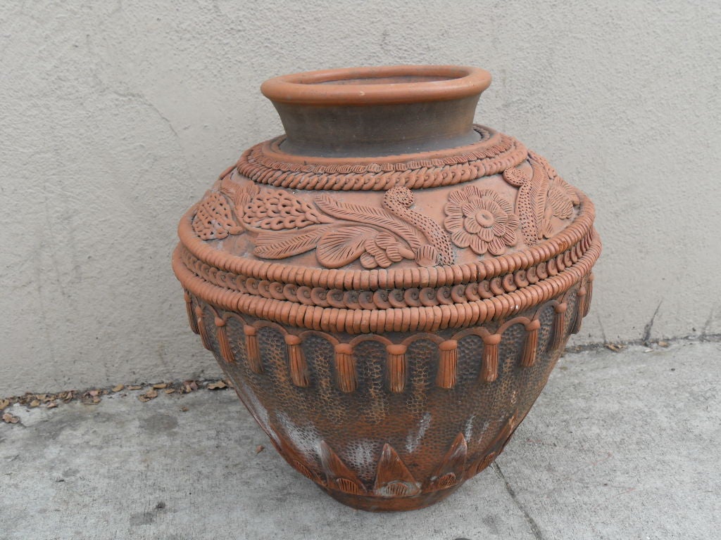 Italian Terra Cotta Pot with applied decor. Extremely decorative.