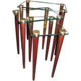 set of three nesting glass , brass and wood side tables