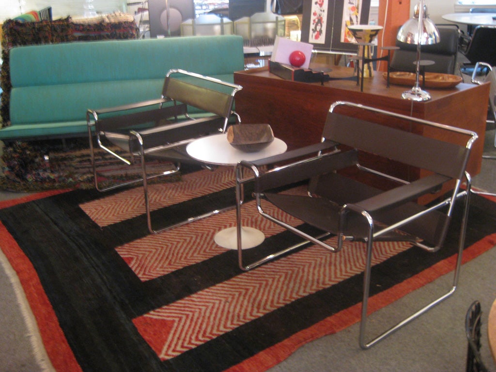 Wassily chairs from the 70's chrome tubing and dark brown leather strapping. Rare one year offered embossed in leather  
