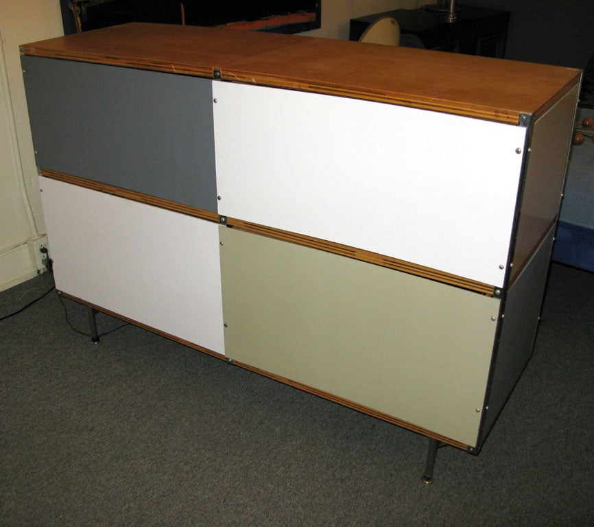 Very Rare ESU in a seldom seen configuration. 12 drawer Eames Storage Unit. Gray, putty and white panels, chrome corners, dovetailed drawers, painted black knobs.