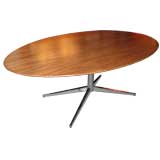 Oval Walnut Table designed by Florence Knoll