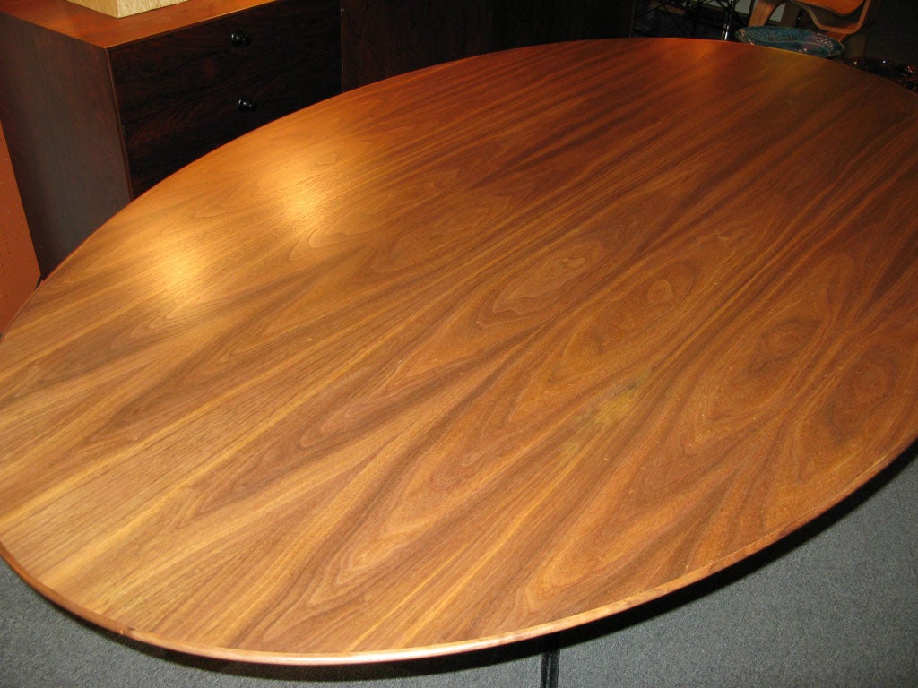 Oval Walnut Table designed by Florence Knoll