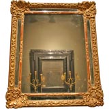 An Elegant Carved Gilt Wood Régence Mirror