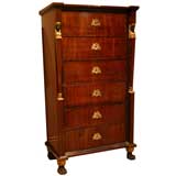 An Austrian Empire Mahogany Six Drawer Tall Chest