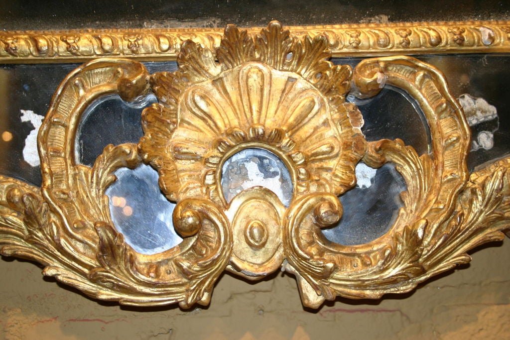 A Grand Régence Bois Doré Mirror with Ho Ho Bird Motif