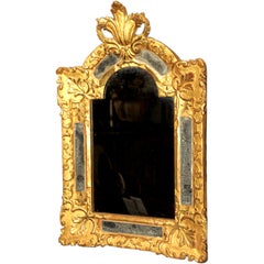 A Stately Régence Carved Bois Doré Mirror
