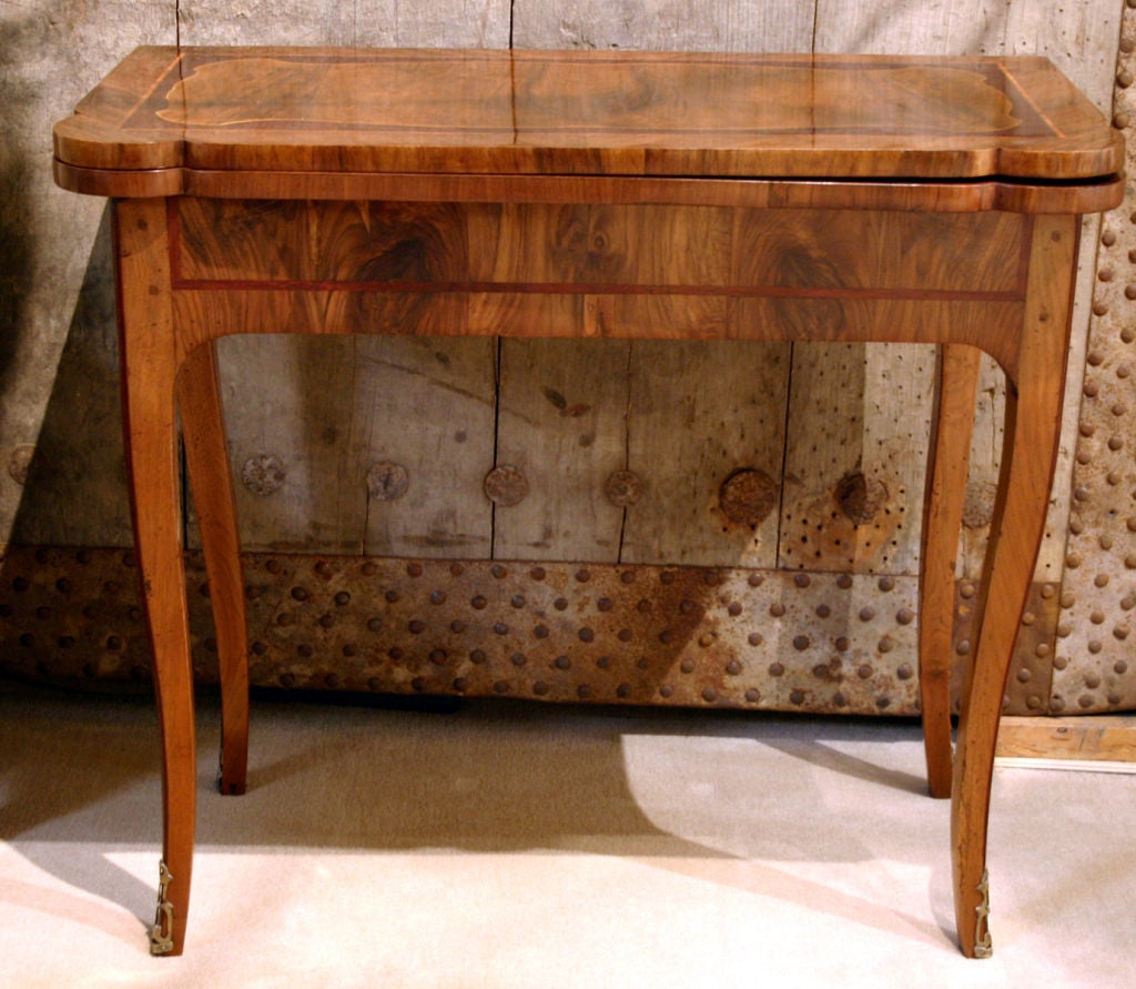 An Elaborate Rococo Italian Marquetry Flip-Top Games Table