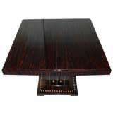 Rulmann style game table with extension leaves in Macassar Ebony