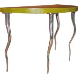 Console Table covered in Cobra with shaped metal legs