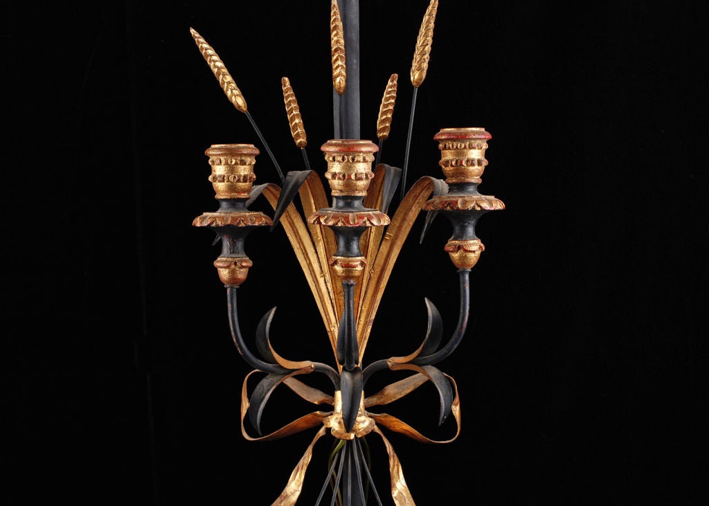 Pair of Vintage Painted Tole Sconces, each with a sword and blades of wheat tied together with a bow. From this bow three wooden candle holders protrude.  Can be electrified upon request.  Elegant pieces.