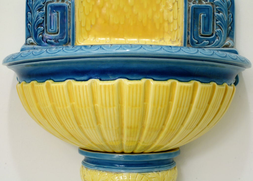 A rare Sarreguemines French Majolica Three-piece Yellow and Blue Wall Fountain or Lavabo.  This beautifully colored wall fountain or 