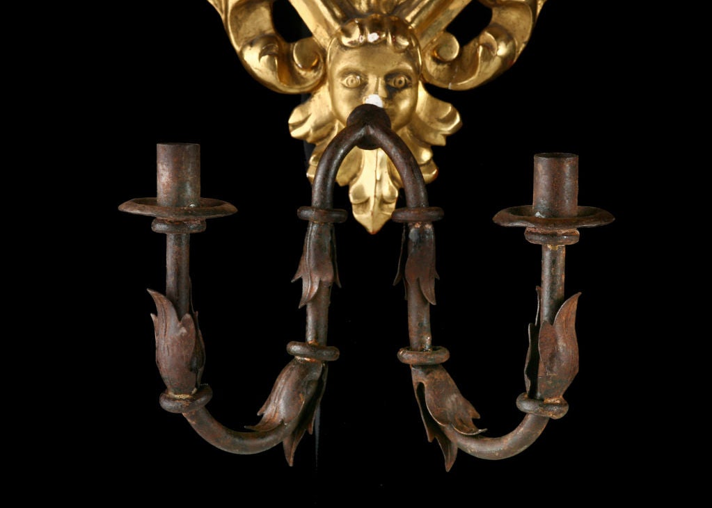 Pair of Italian Antique Giltwood Mirrored Sconces with Original Glass and Cast Iron Candle holders.  Can be electrified upon request.