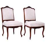 Pair of French Antique Walnut Regence-style Carved Side Chairs