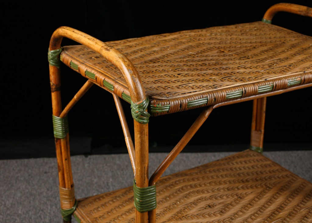Charming French Antique Rattan Rolling Dessert Cart with Green Accents perfect as a side table or accent table.  Please see our additional collection of antique rattan furniture at www.alhambraantiques.com.