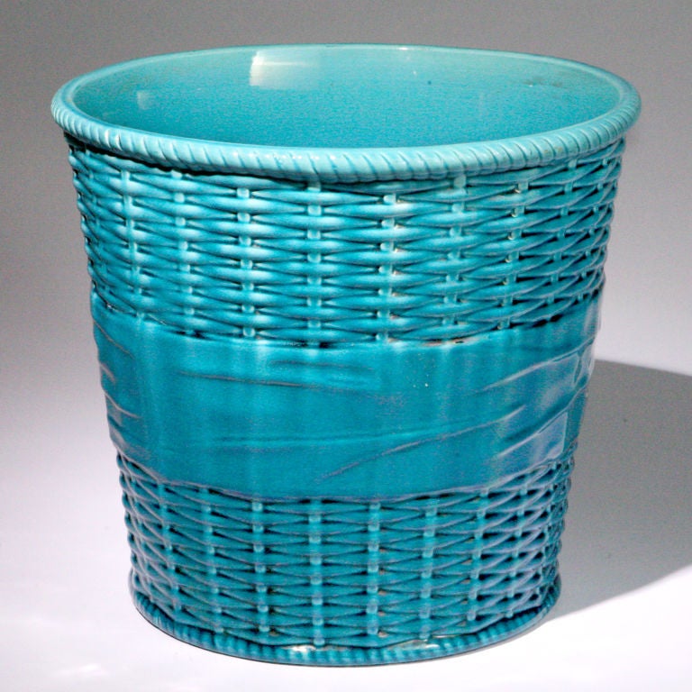 Large Minton Majolica planter in turquoise designed in a basketweave pattern with a large tied bow arround the middle. Impressed: Mintons Pattern #2721 Date Code: 1911.