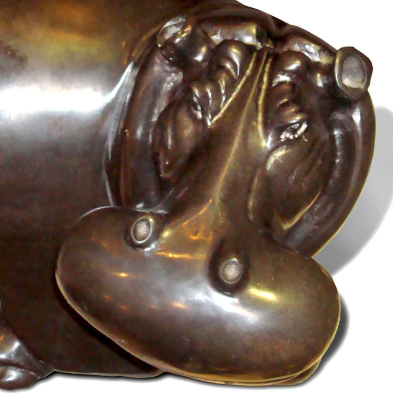 Large carved African hippo sculpture of highly polished black springstone.  This serious hippopotamus has a pensive expression, large wide muzzle and round broad back.  Signed by artist: Edwin Chandiringo.  Mined by hand on communal lands in Guruve,