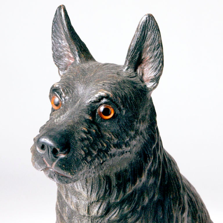 Unusual 19th century English terracotta Scottie or mixed terrier dog in a seated position. Charming copy of a particular dog with a sweet expression and demeanour.