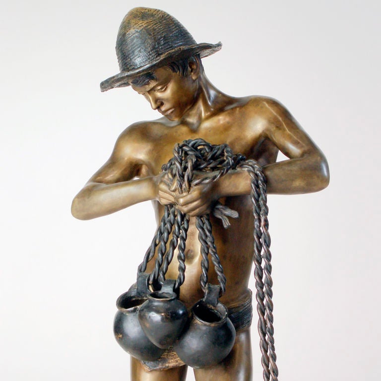 BRONZE STATUE WATER CARRIER