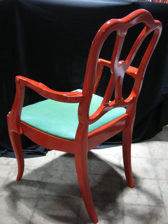 Elegant pair of ribbon back open arm chairs, lacquered in a high gloss chinese chippendale red. Fabulous for and details on backs and arms, cabirole legs,orignal aqua pleather seats. For additional chairs, end/coffee/side/dining/center tables,